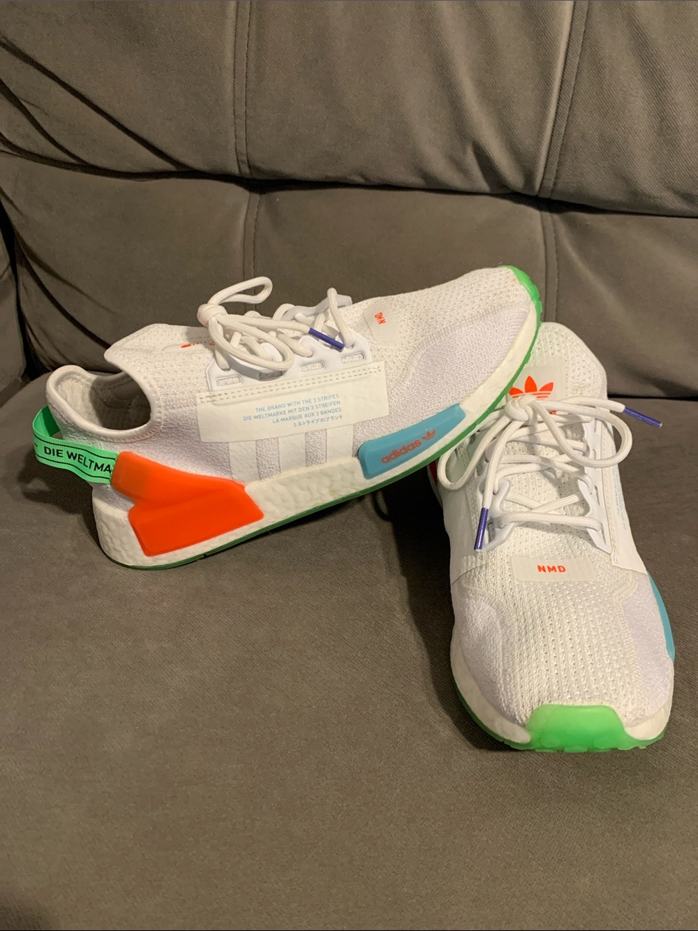 Adidas NMD White Sneakers with Green & Orange Accents